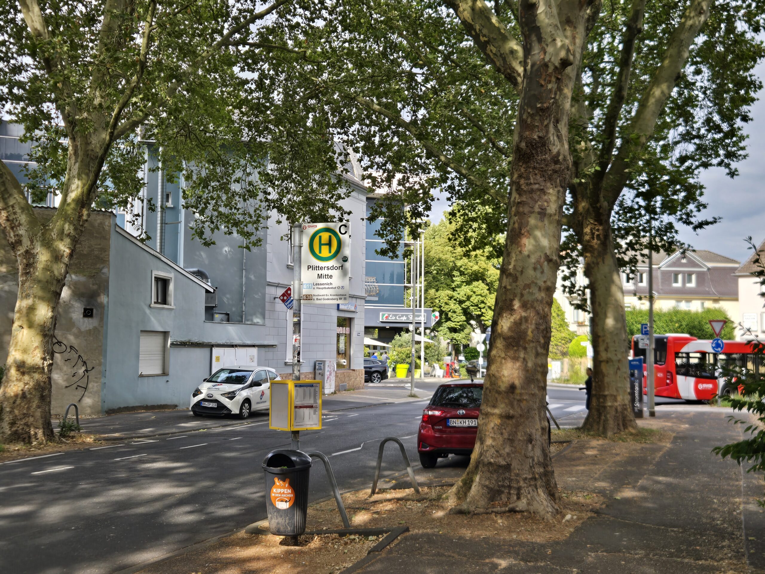 Get off the bus at Plittersdorf Mitte and walk towards the traffic circle