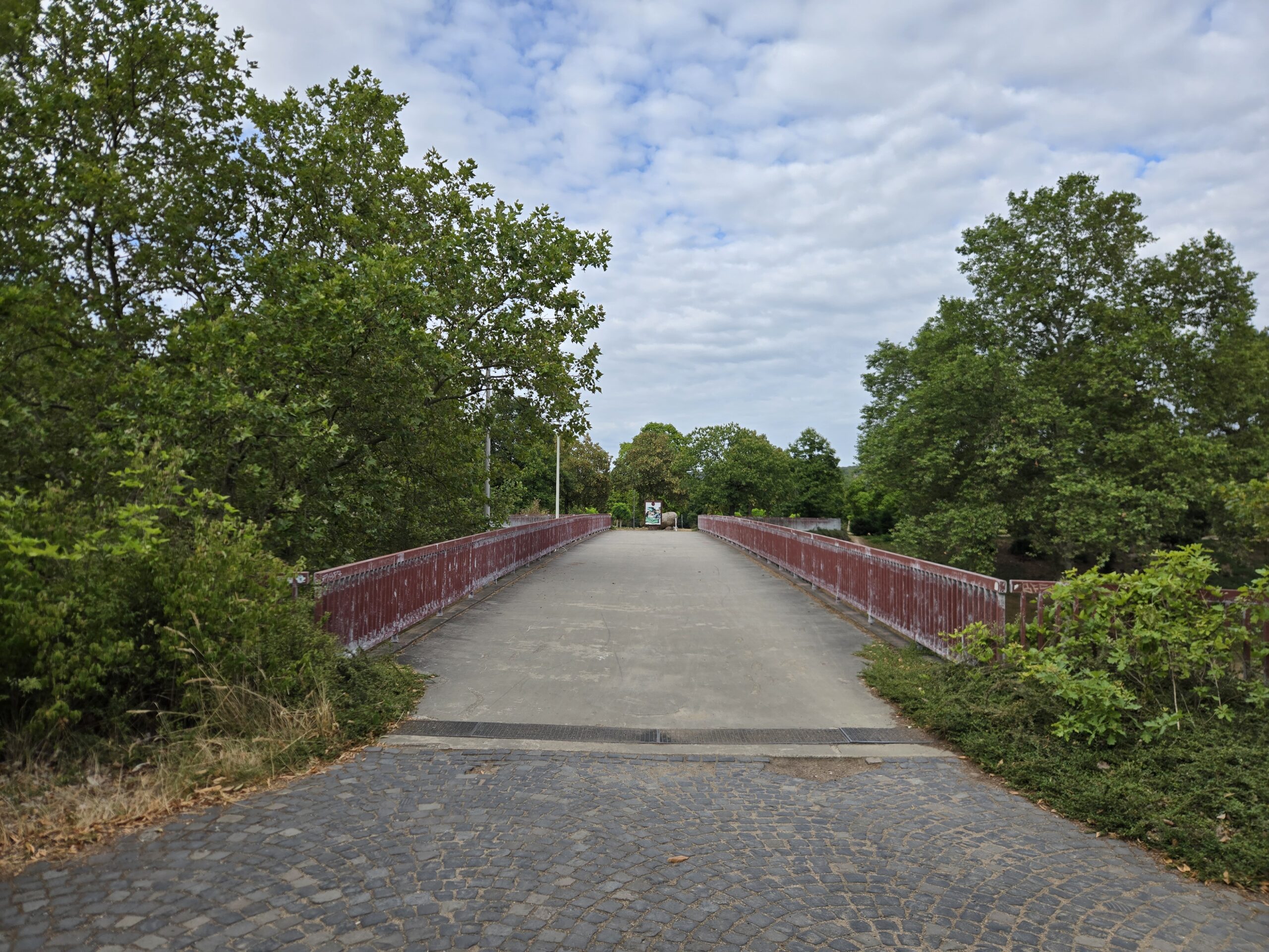 You have found the bridge, walk across it and yield to the left